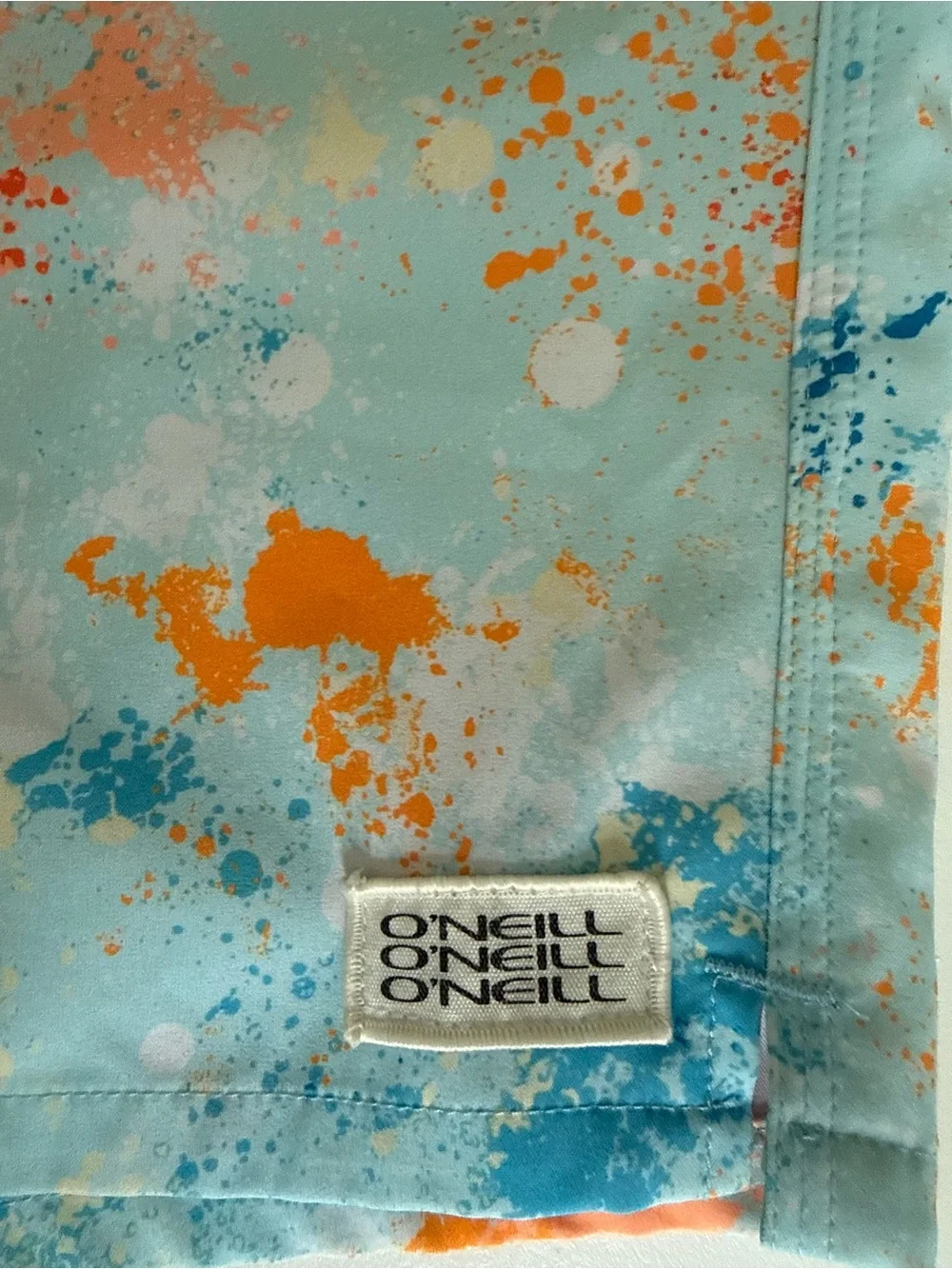 O'Neill Light Blue Swim Trunks 17” with Orange & Blue Splash Print